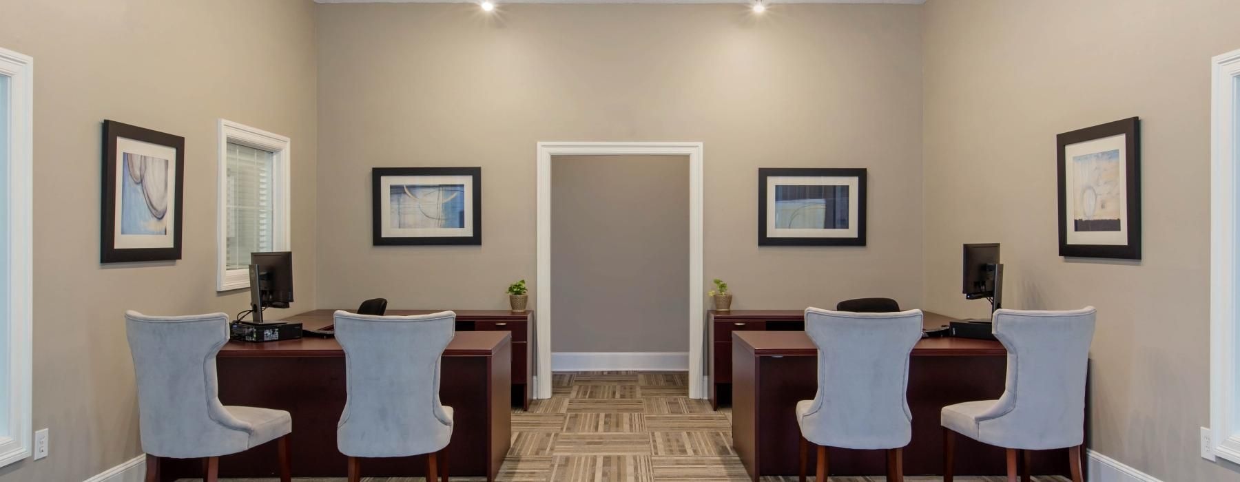 a room with a table and chairs