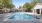 a swimming pool in a backyard