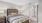 a bedroom with a bed and lamps
