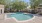 a swimming pool in a backyard